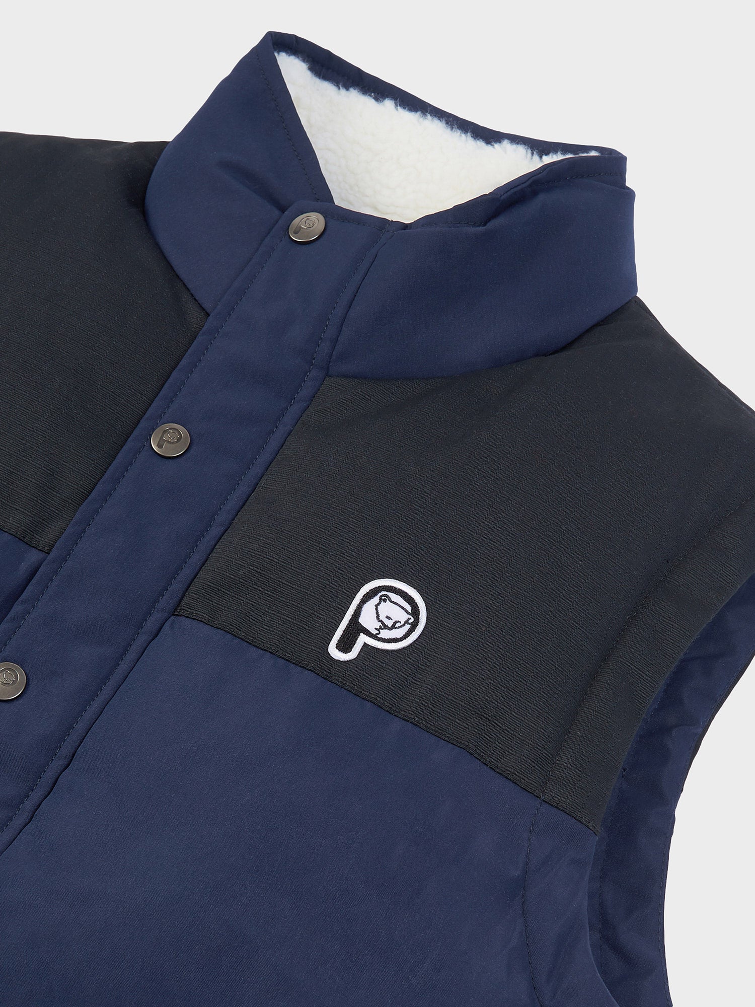 P Bear Cut + Sew Funnel Neck Puffer Vest in Navy Blue